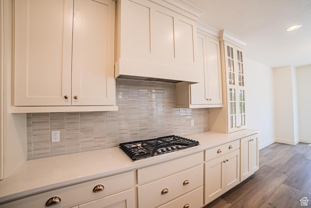 10926 S Little Sahara Dr Unit 1002, South Jordan, UT 84009 - kitchen with stainless steel gas cooktop, baseboards, wood finished floors, light countertops, and recessed lighting
