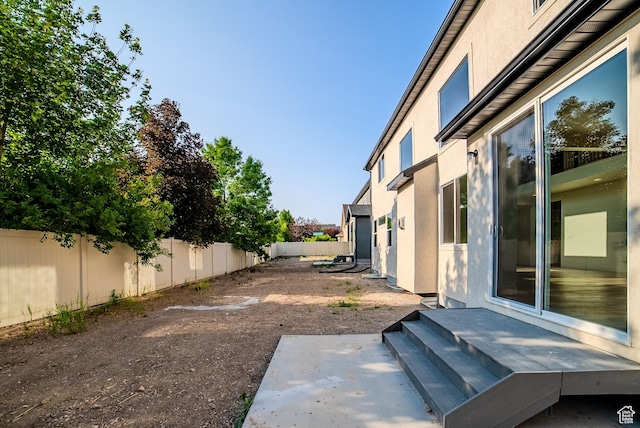 10926 S Little Sahara Dr Unit 1002, South Jordan, UT 84009 - fenced backyard with a patio area