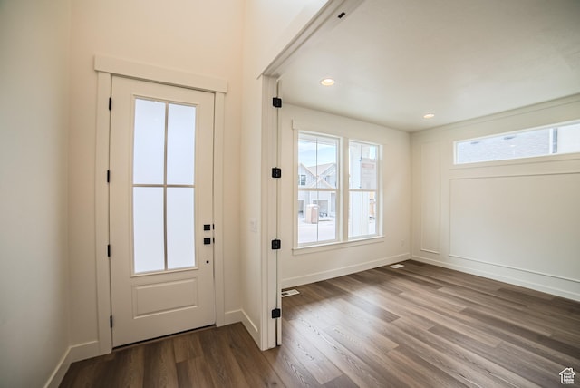 10926 S Little Sahara Dr Unit 1002, South Jordan, UT 84009 - doorway featuring dark wood-style flooring, baseboards, and recessed lighting