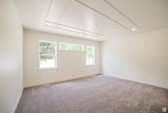10926 S Little Sahara Dr Unit 1002, South Jordan, UT 84009 - carpeted empty room with plenty of natural light, baseboards, recessed lighting, and attic access