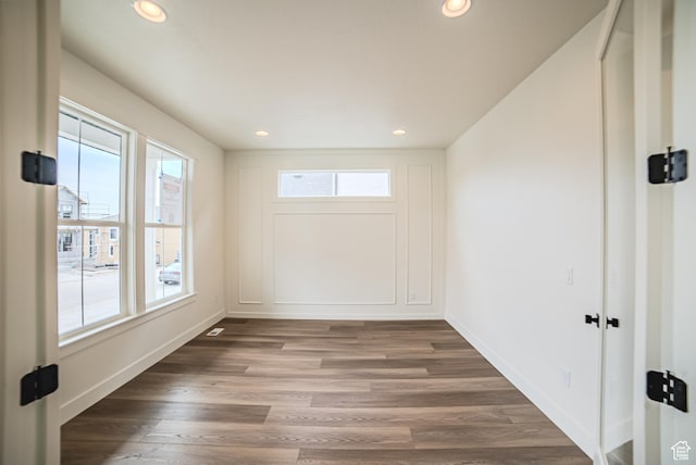 10926 S Little Sahara Dr Unit 1002, South Jordan, UT 84009 - unfurnished room featuring recessed lighting, baseboards, and wood finished floors