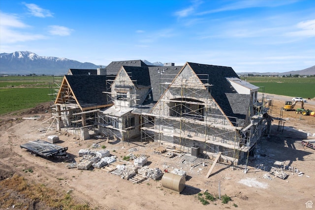 2556 W 5600 S, Lake Shore, UT 84660 - view of home's exterior featuring roof with shingles, a view of countryside, a mountain view, and a chimney