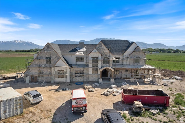 2556 W 5600 S, Lake Shore, UT 84660 - view of front of house with a mountain view, a balcony, a rural view, stone siding, and roof with shingles