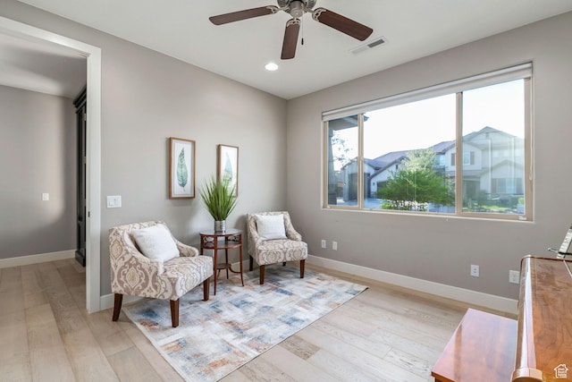 2914 E 1880 S, St George, UT 84790 - sitting room featuring light wood-style flooring, recessed lighting, ceiling fan, and baseboards