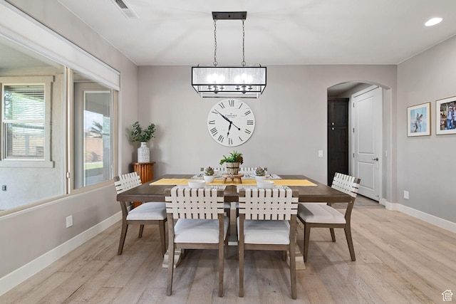 2914 E 1880 S, St George, UT 84790 - dining area with arched walkways, light wood-type flooring, baseboards, recessed lighting, and a chandelier