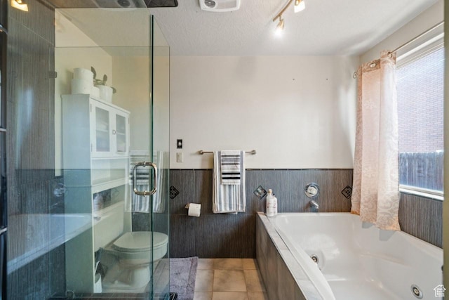 2045 W 5025 S, Roy, UT 84067 - bathroom with radiator heating unit, a whirlpool tub, a stall shower, tile patterned floors, and a wainscoted wall