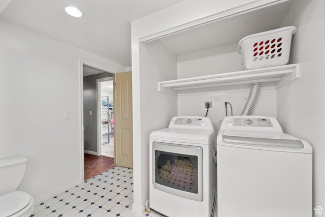 2045 W 5025 S, Roy, UT 84067 - laundry area featuring washing machine and clothes dryer and light floors