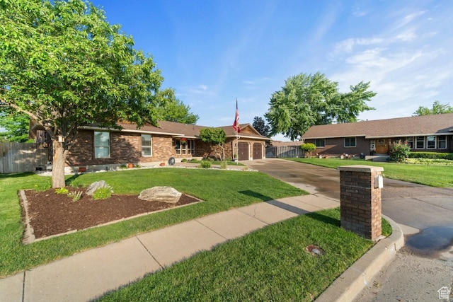 2045 W 5025 S, Roy, UT 84067 - single story home featuring concrete driveway, a garage, and brick siding