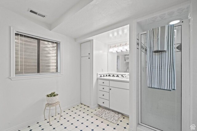 2045 W 5025 S, Roy, UT 84067 - full bath with vanity, a shower stall, and tile patterned floors