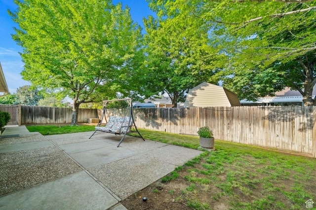 2045 W 5025 S, Roy, UT 84067 - fenced backyard featuring a patio area