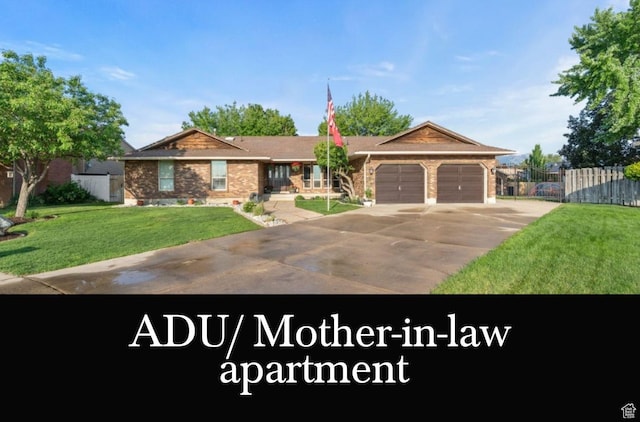 2045 W 5025 S, Roy, UT 84067 - ranch-style house with an attached garage, brick siding, and concrete driveway