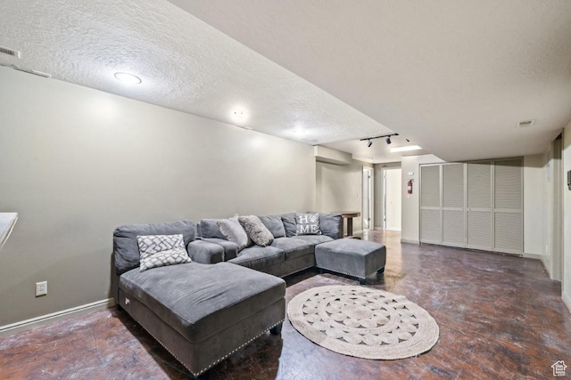 2045 W 5025 S, Roy, UT 84067 - living room featuring a textured ceiling and baseboards