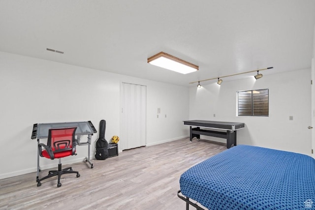 2045 W 5025 S, Roy, UT 84067 - bedroom with wood finished floors and rail lighting
