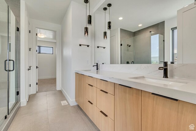 13393 S Sky Ranch Rd, Herriman, UT 84096 - bathroom with a shower stall, double vanity, baseboards, tile patterned flooring, and recessed lighting