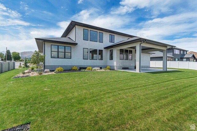 13393 S Sky Ranch Rd, Herriman, UT 84096 - back of house with a patio and stucco siding