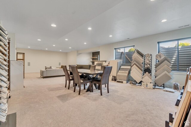 13393 S Sky Ranch Rd, Herriman, UT 84096 - dining area with light carpet, healthy amount of natural light, recessed lighting, stairs, and baseboards
