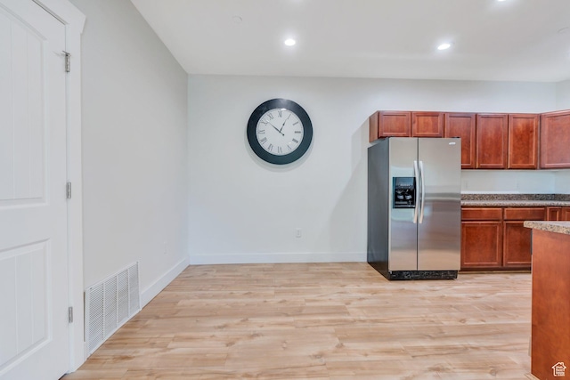 143 W Spring Hill Way N, Saratoga Springs, UT 84045 - kitchen with stainless steel refrigerator with ice dispenser, light wood finished floors, baseboards, and recessed lighting