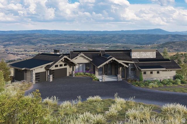 9747 N Ridgeway Cir Unit Rw-21, Kamas, UT 84036 - view of front of home with stone siding, a garage, a mountain view, and driveway