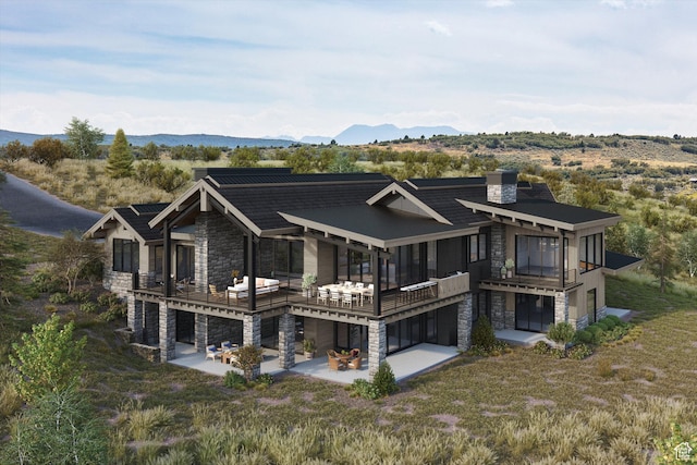 9747 N Ridgeway Cir Unit Rw-21, Kamas, UT 84036 - back of house with stone siding, a balcony, a patio, and a chimney
