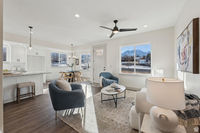 345 E 100 S, Santaquin, UT 84655 - living room with dark wood-type flooring, recessed lighting, a chandelier, ceiling fan, and baseboards