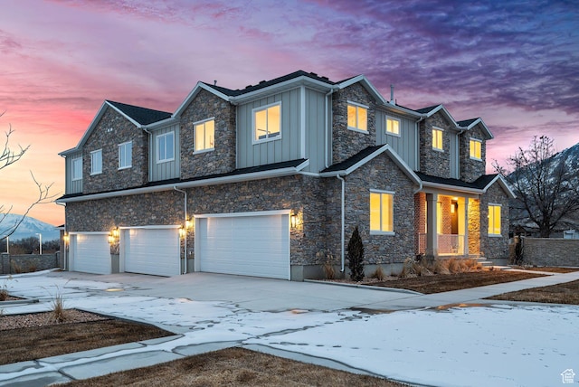 345 E 100 S, Santaquin, UT 84655 - craftsman-style house with board and batten siding, a garage, stone siding, and driveway