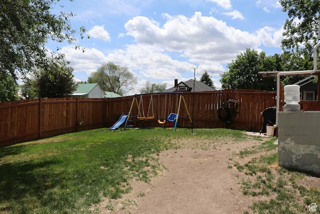 484 N Main St, Malad City, ID 83252 - fenced backyard with a playground