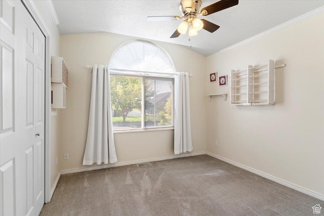 1403 Gleneagles Dr, Syracuse, UT 84075 - empty room with ceiling fan, carpet floors, baseboards, a textured ceiling, and vaulted ceiling