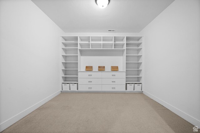 4771 W Juniper Bend Cir, Herriman, UT 84096 - walk in closet featuring light colored carpet