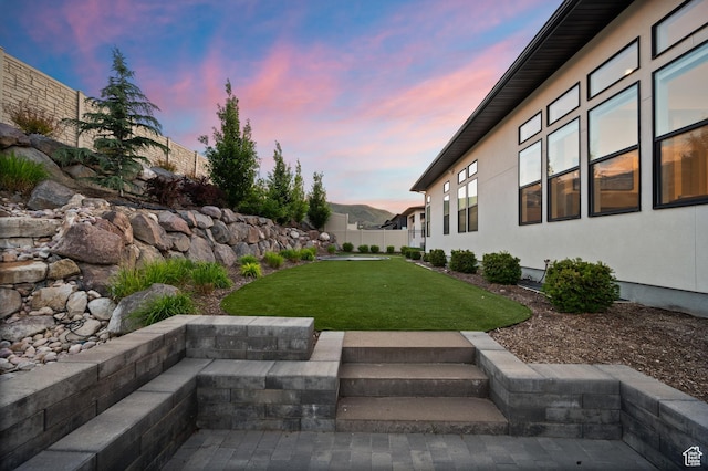 4771 W Juniper Bend Cir, Herriman, UT 84096 - view of yard at dusk