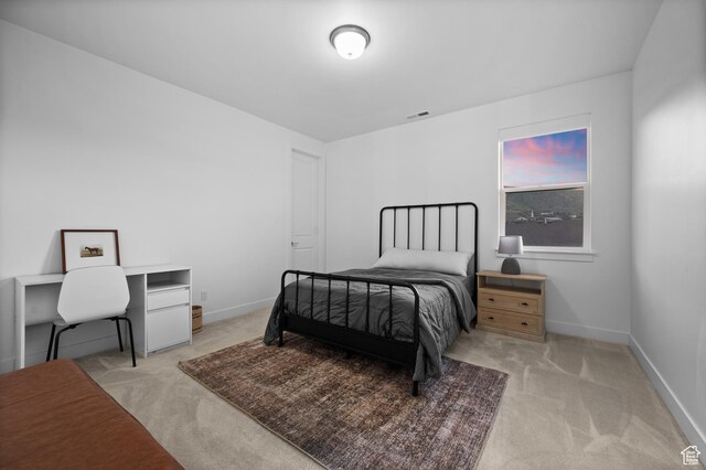 4771 W Juniper Bend Cir, Herriman, UT 84096 - bedroom with light carpet and baseboards