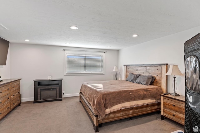 221 S 200 E, Centerville, UT 84014 - bedroom featuring light colored carpet, recessed lighting, baseboards, a fireplace, and a textured ceiling