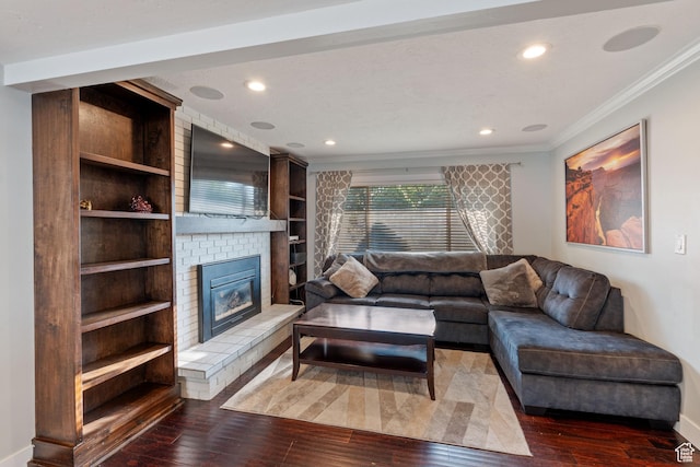 221 S 200 E, Centerville, UT 84014 - living room featuring crown molding, hardwood / wood-style flooring, a fireplace, recessed lighting, and baseboards