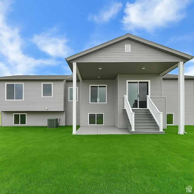 3171 W 5700 S, Roy, UT 84067 - back of house featuring a patio, a yard, and central air condition unit