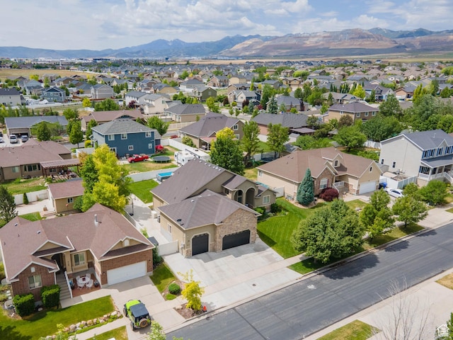 6121 W Indian Oak Dr S, West Jordan, UT 84081 - aerial perspective of suburban area with a mountain backdrop