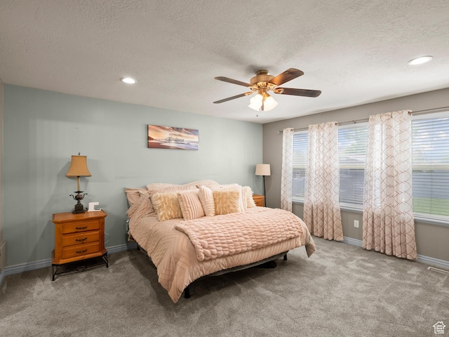 6121 W Indian Oak Dr S, West Jordan, UT 84081 - carpeted bedroom with a textured ceiling, baseboards, a ceiling fan, and recessed lighting