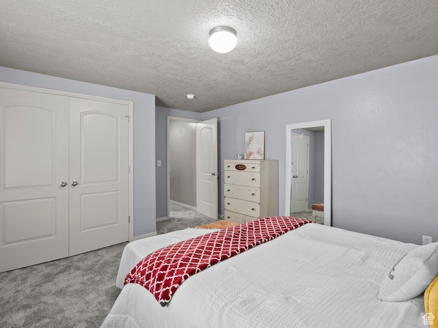 6121 W Indian Oak Dr S, West Jordan, UT 84081 - carpeted bedroom featuring a closet and a textured ceiling