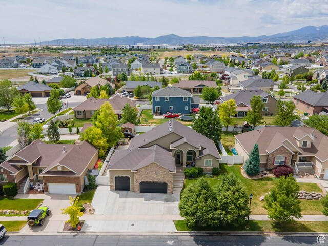 6121 W Indian Oak Dr S, West Jordan, UT 84081 - aerial perspective of suburban area featuring a mountainous background
