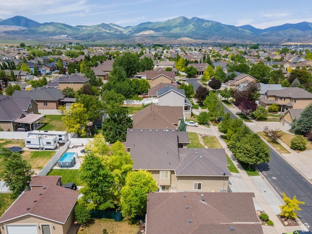 6121 W Indian Oak Dr S, West Jordan, UT 84081 - aerial perspective of suburban area with a mountain backdrop
