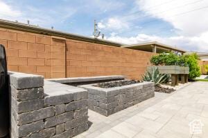 3454 W 150th St N, Hurricane, UT 84737 - view of patio / terrace featuring an outdoor fire pit