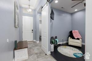 3454 W 150th St N, Hurricane, UT 84737 - entrance foyer with a barn door, ceiling fan, baseboards, and recessed lighting