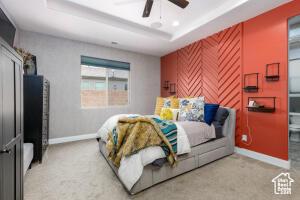 3454 W 150th St N, Hurricane, UT 84737 - carpeted bedroom featuring baseboards, a tray ceiling, and ceiling fan