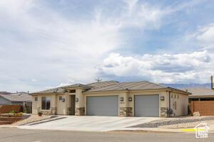 3454 W 150th St N, Hurricane, UT 84737 - view of front of house featuring a garage and driveway