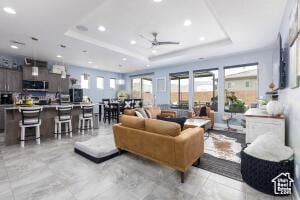 3454 W 150th St N, Hurricane, UT 84737 - living room featuring a raised ceiling, recessed lighting, and ceiling fan