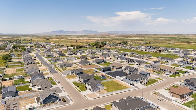 5258 W 3750 S, Hooper, UT 84315 - aerial view of property and surrounding area featuring a mountainous background and nearby suburban area