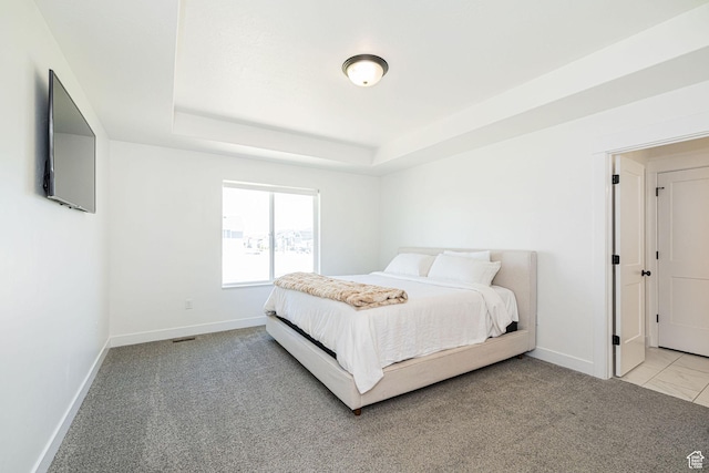 5258 W 3750 S, Hooper, UT 84315 - bedroom featuring baseboards, a raised ceiling, and light carpet