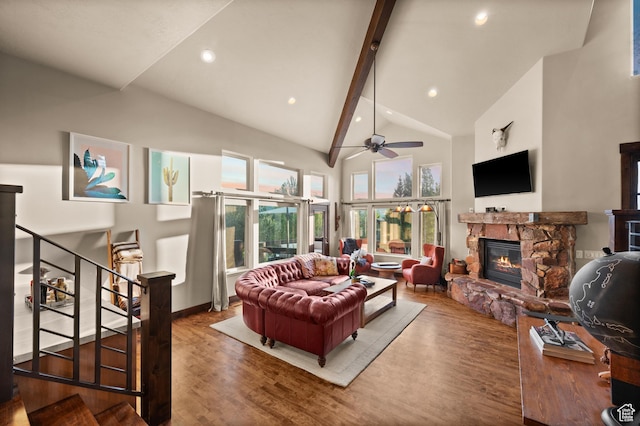 8932 Flint Way, Park City, UT 84098 - living room featuring a fireplace, beamed ceiling, wood finished floors, high vaulted ceiling, and stairs