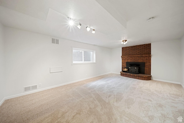 1591 E Waters Ln, Sandy, UT 84093 - unfurnished living room with track lighting, carpet floors, and baseboards