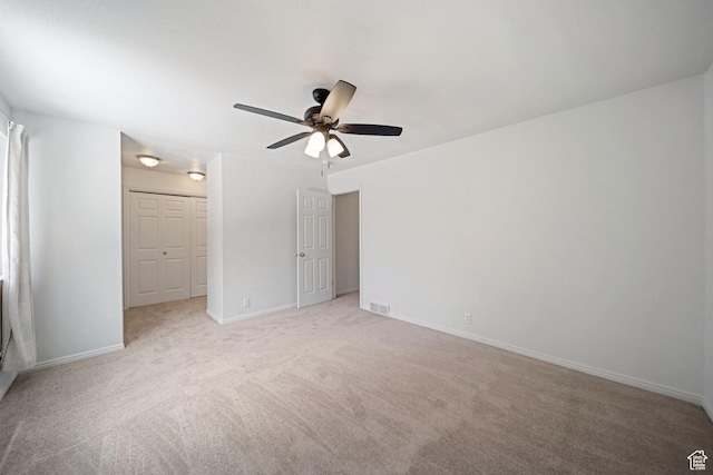 1591 E Waters Ln, Sandy, UT 84093 - unfurnished bedroom featuring light colored carpet, baseboards, and ceiling fan