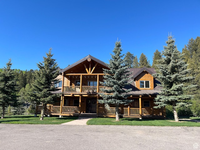2665 Government Dam Rd, Soda Springs, ID 83276 - cabin featuring a porch, a balcony, and log siding