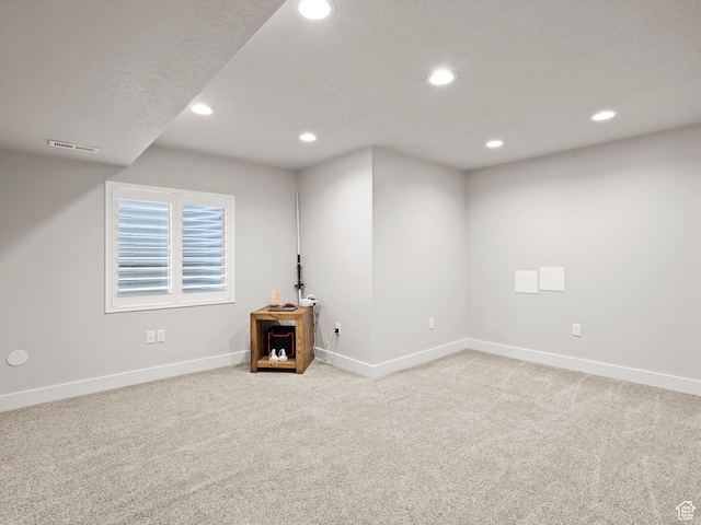 9558 S Lea Heather Way, West Jordan, UT 84081 - below grade area featuring light colored carpet, recessed lighting, and baseboards